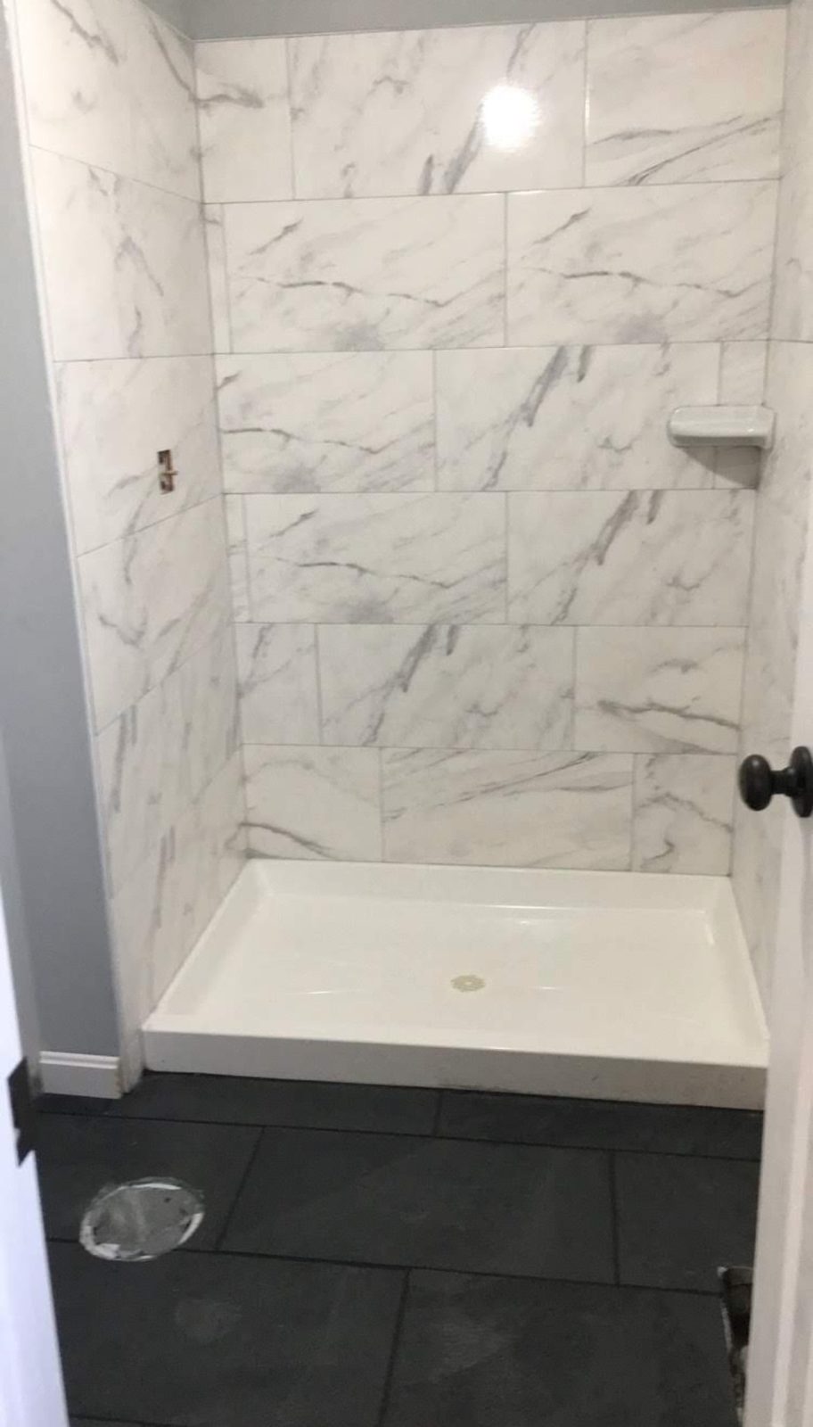 Compact marble-look stall shower